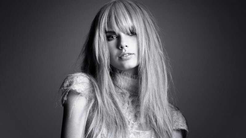 woman with long hair and bangs