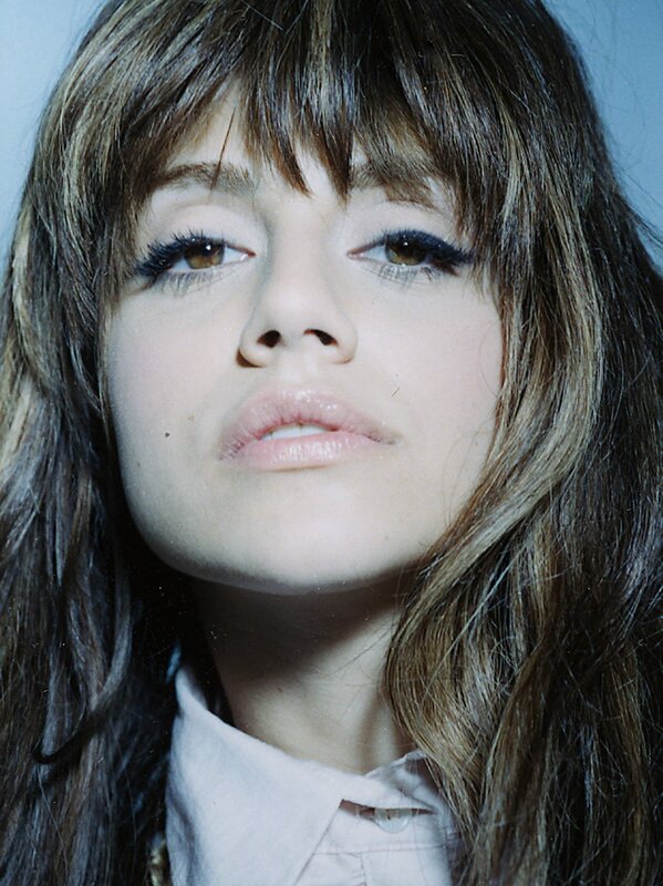 woman with long hair and bangs