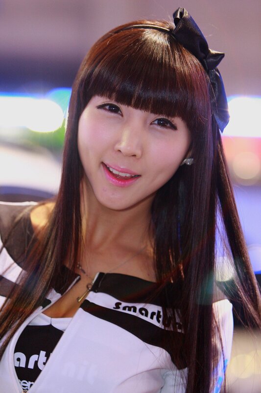 woman with long hair and bow