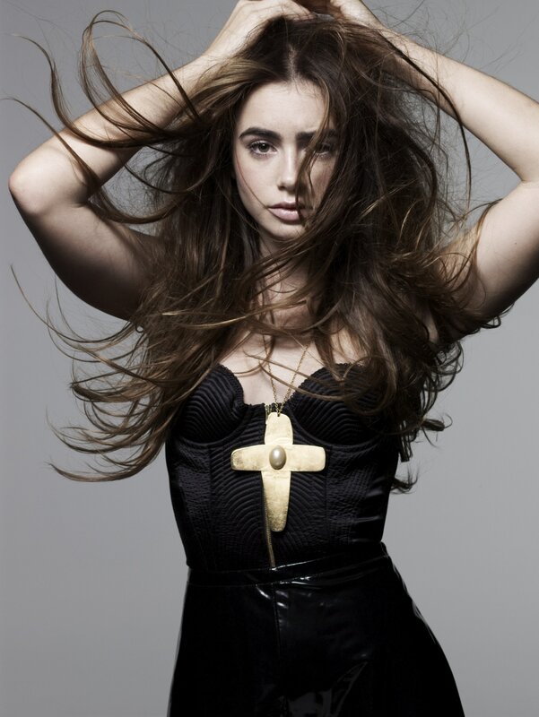 Woman with long hair and cross necklace
