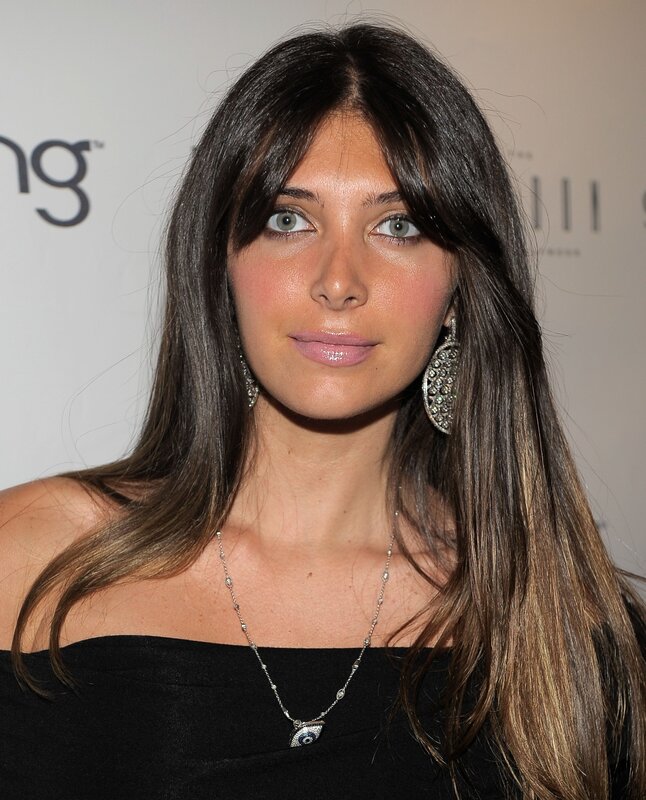 woman with long hair and earrings