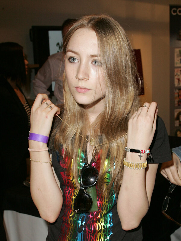 woman with long hair and jewelry