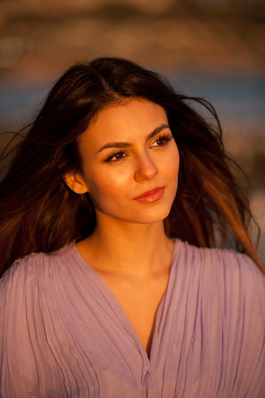 woman with long hair at sunset