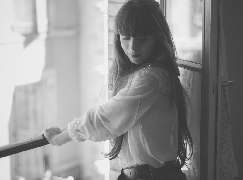 Woman with Long Hair — Black, Contemplative, Photograph, Window, Balcony