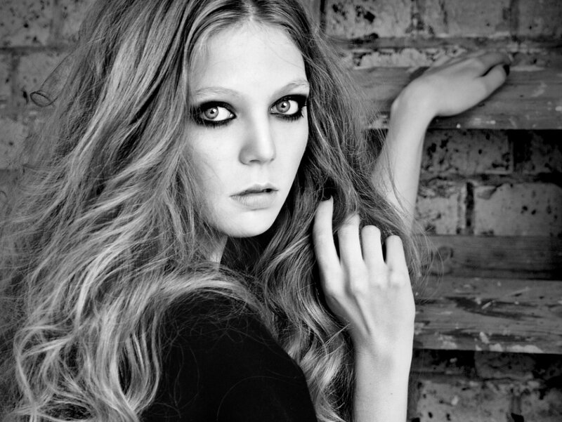 Woman with Long Hair — Black, Dramatic, Photograph, Brick Wall