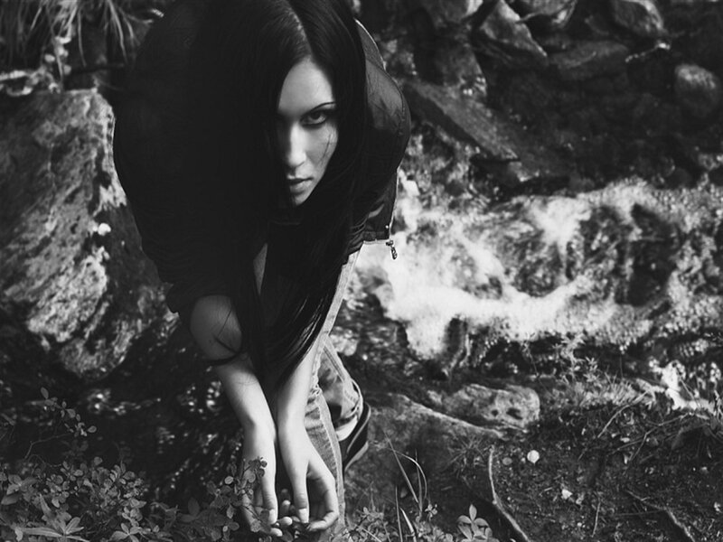 Woman with Long Hair — Black, Dramatic, Photograph, Rocks