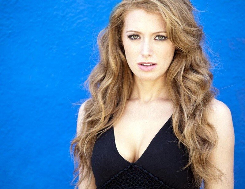 Woman with Long Hair — Blue, Neutral, Photograph, Black Top, Blue Wall