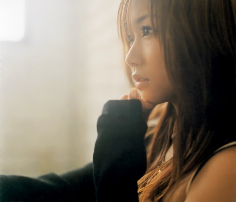 Woman with Long Hair — Brown, Contemplative, Photograph, Window