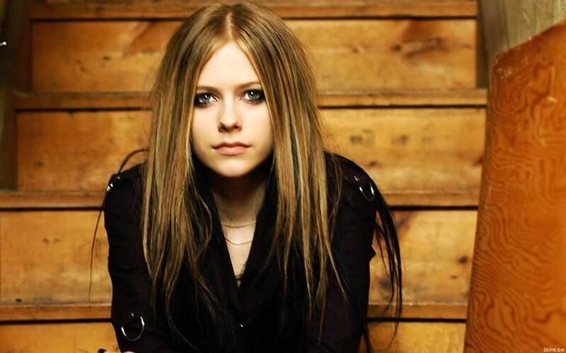 Woman with Long Hair — Brown, Serious, Photograph, Wooden Wall, Black Jacket