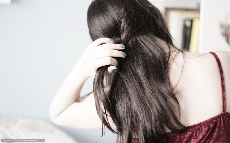 woman with long hair from behind