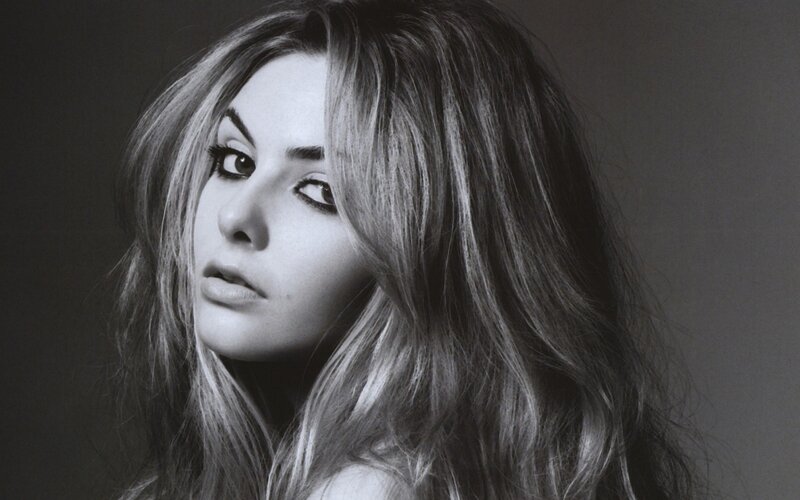 woman with long hair in black and white