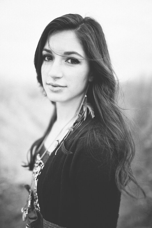 woman with long hair in black and white