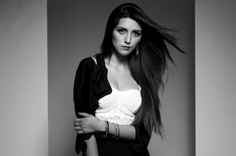 woman with long hair in black and white