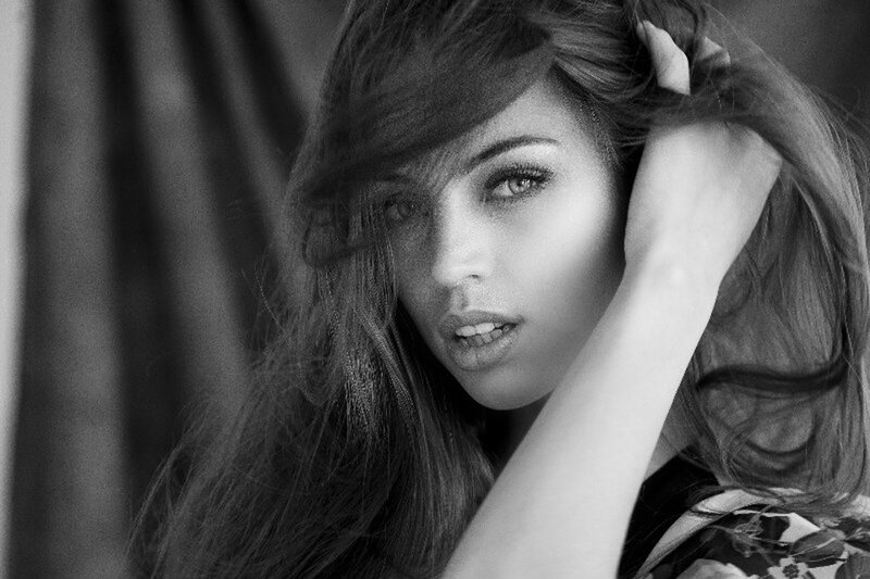 woman with long hair in black and white