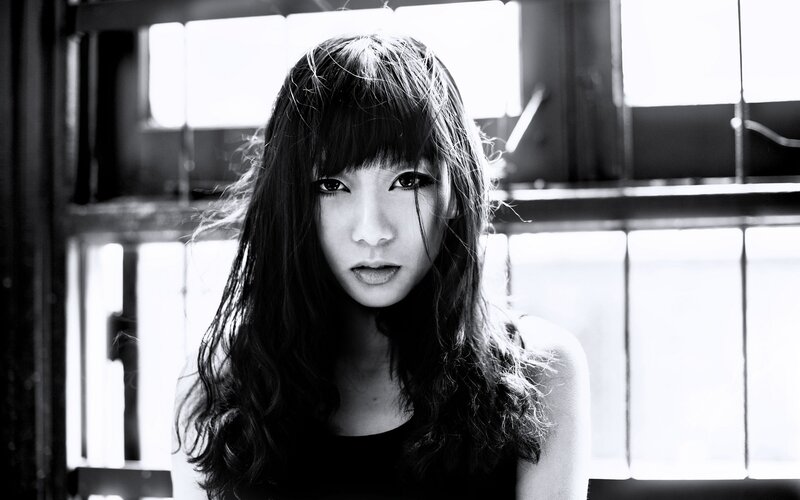 woman with long hair in black and white