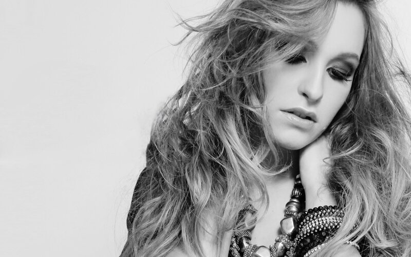 woman with long hair in black and white