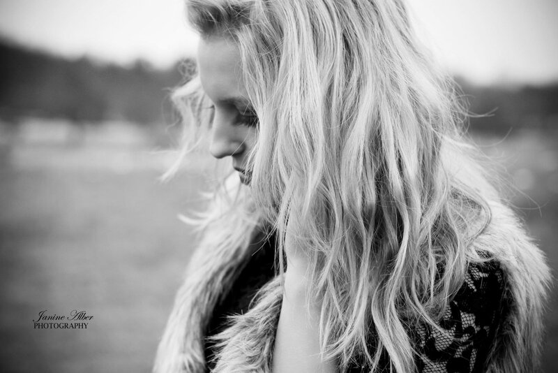 woman with long hair in black and white