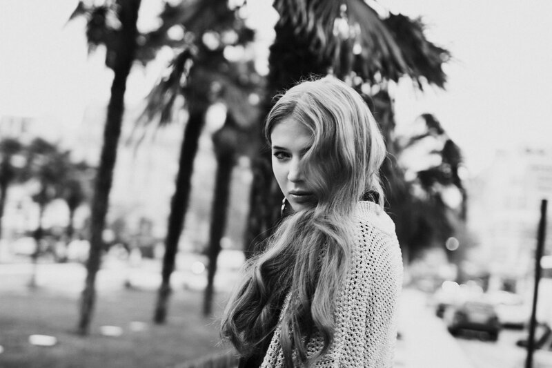 woman with long hair in black and white