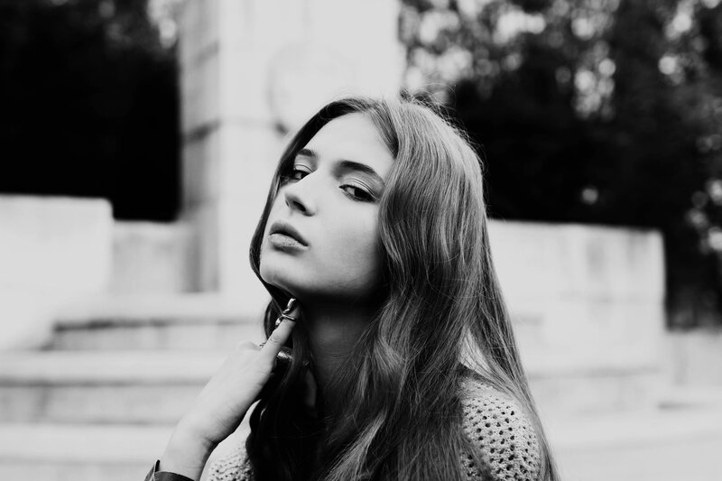 woman with long hair in black and white