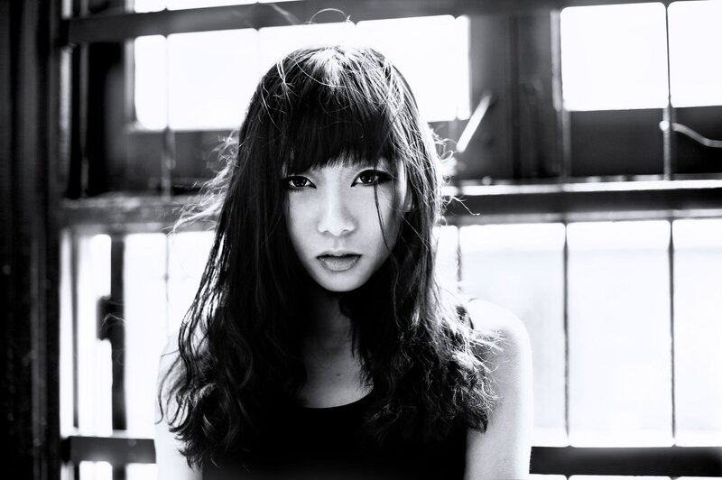 woman with long hair in black and white