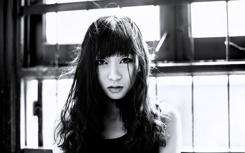 woman with long hair in black and white