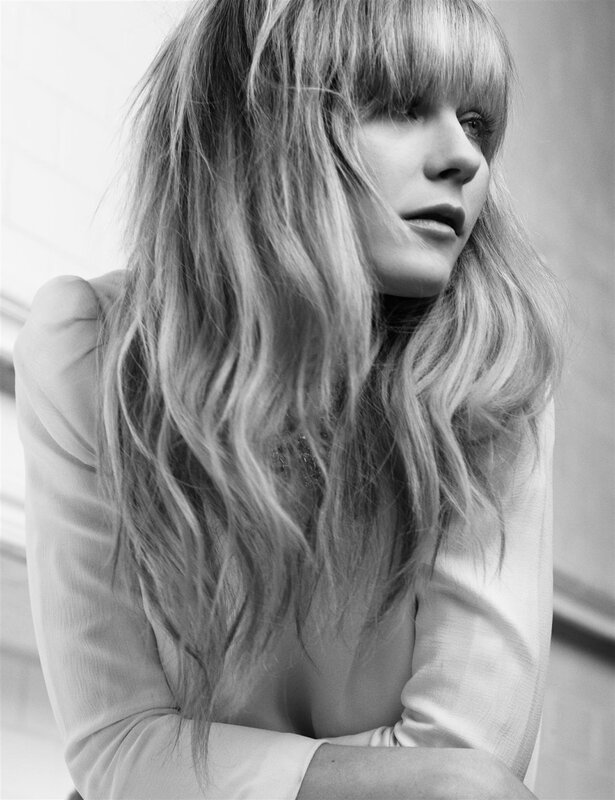 woman with long hair in black and white