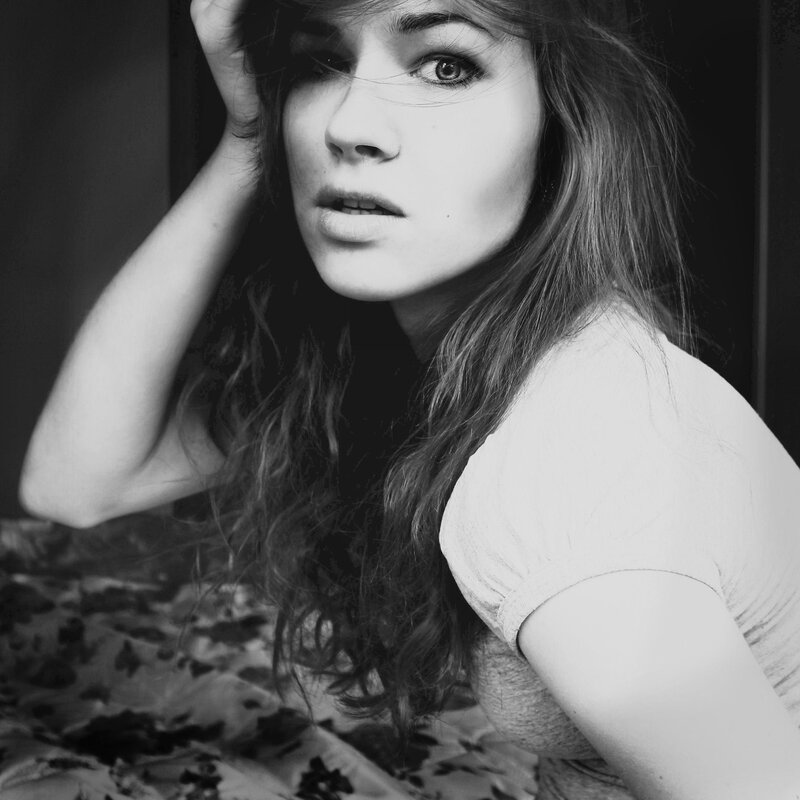 woman with long hair in black and white