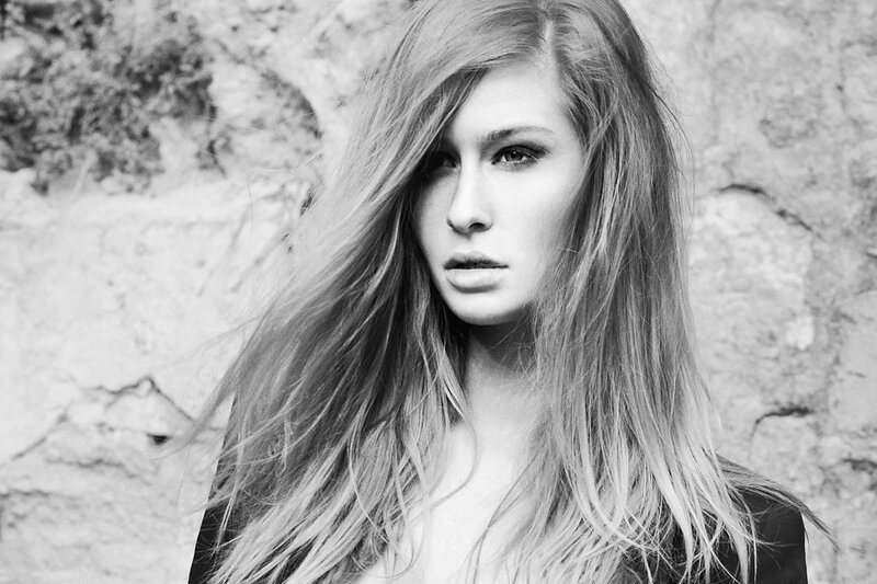 woman with long hair in black and white