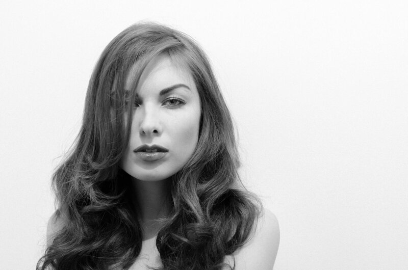 woman with long hair in black and white