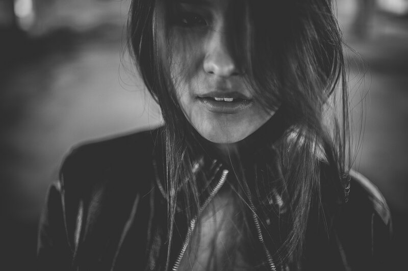 woman with long hair in black and white