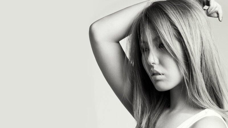 woman with long hair in black and white