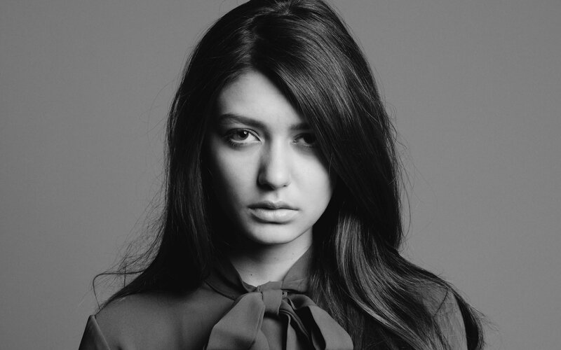 woman with long hair in black and white