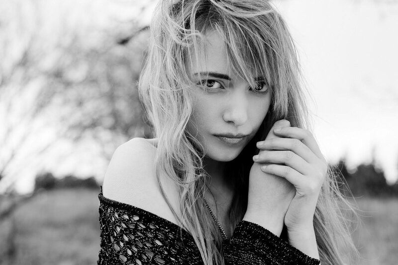 woman with long hair in black and white