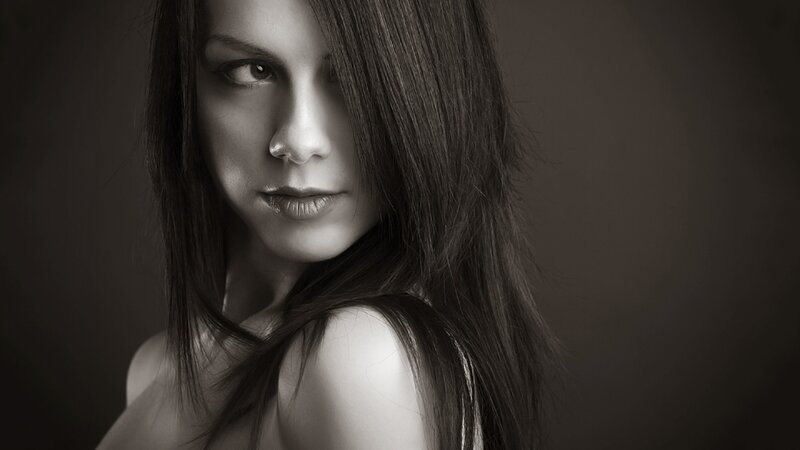 woman with long hair in black and white