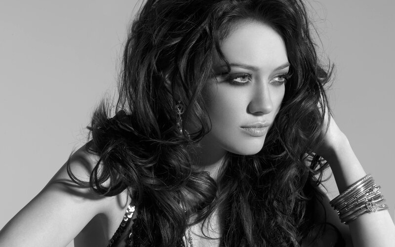 woman with long hair in black and white