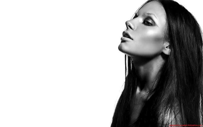 woman with long hair in black and white