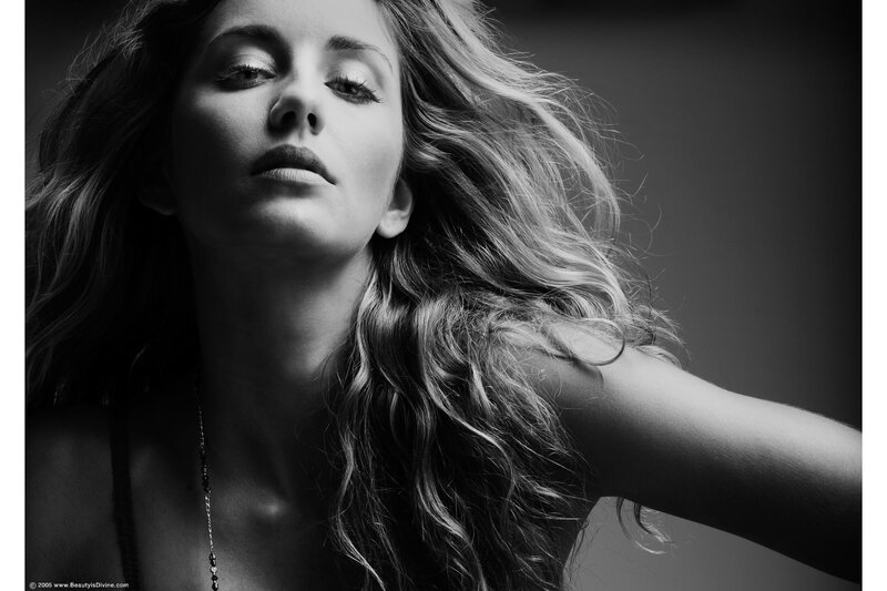 woman with long hair in black and white