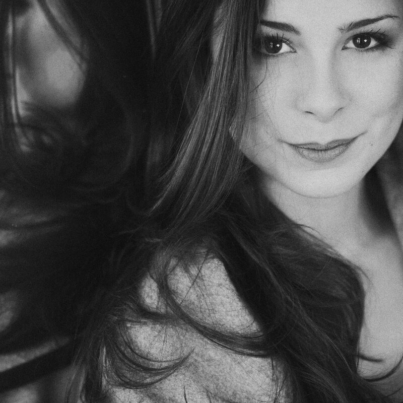 woman with long hair in black and white