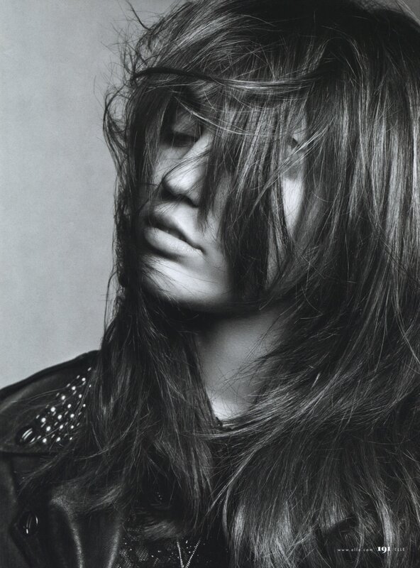 woman with long hair in black and white