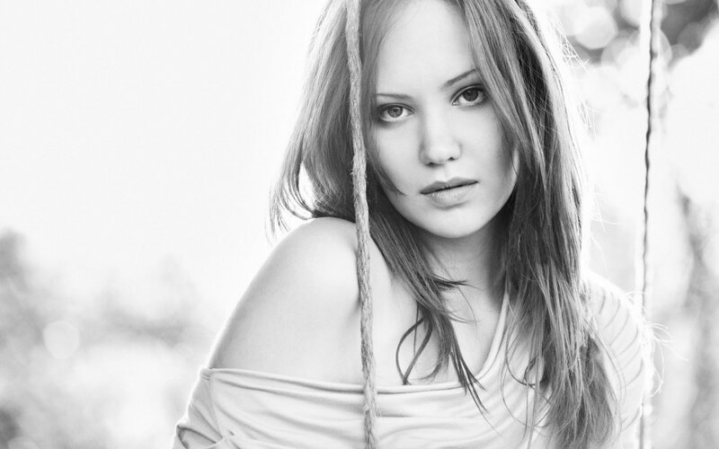 woman with long hair in black and white