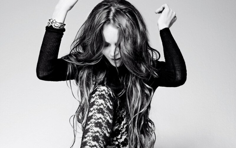 woman with long hair in black and white
