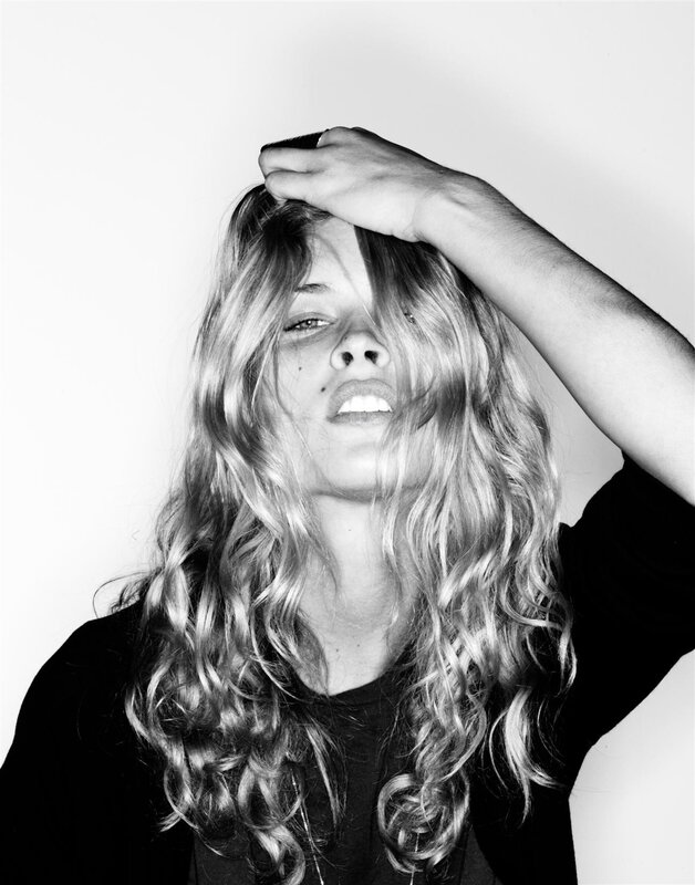 woman with long hair in black and white