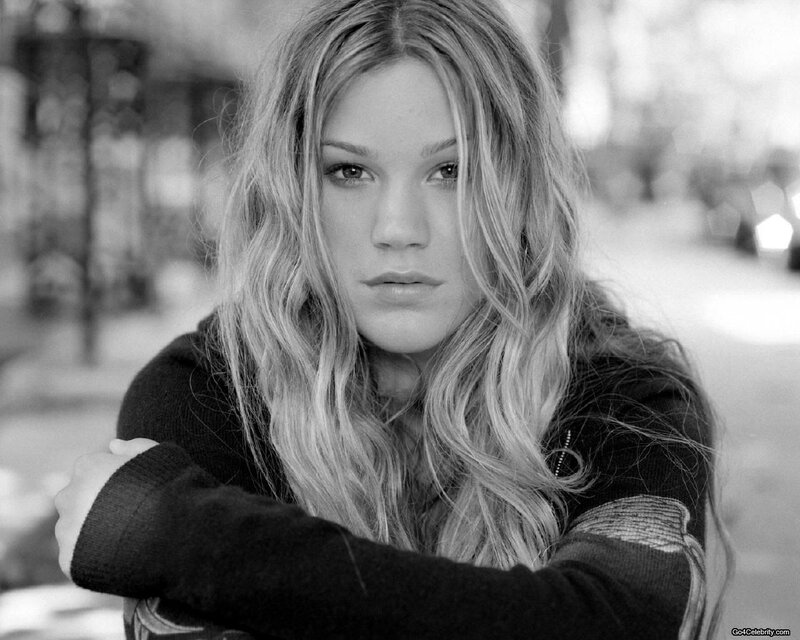 woman with long hair in black and white