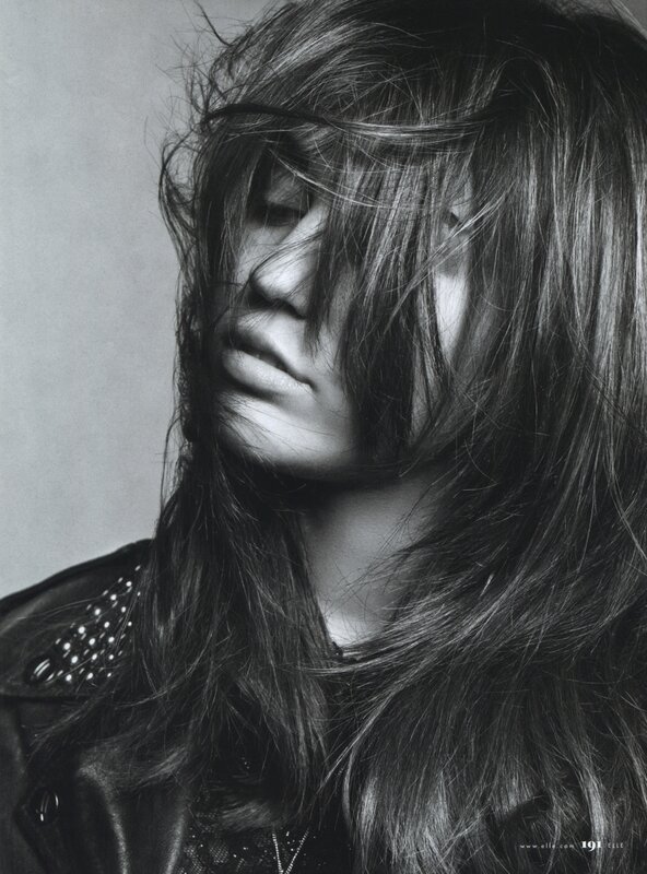 woman with long hair in black and white