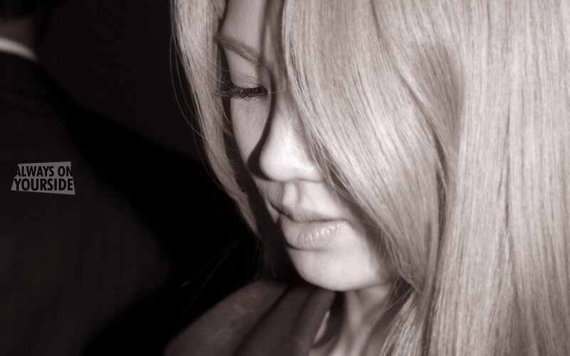 woman with long hair in black and white