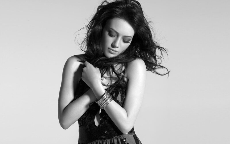 woman with long hair in black and white