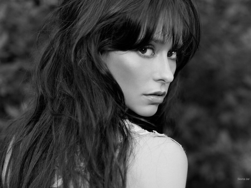 woman with long hair in black and white
