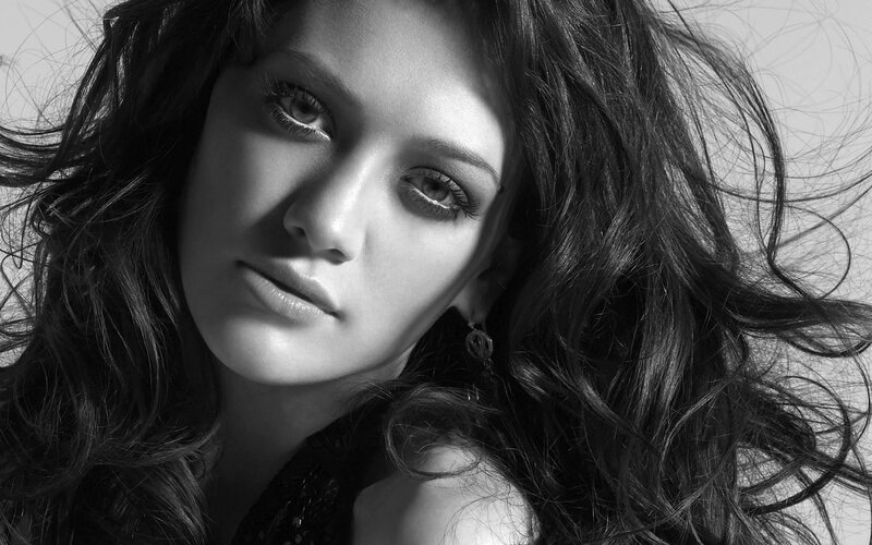 woman with long hair in black and white