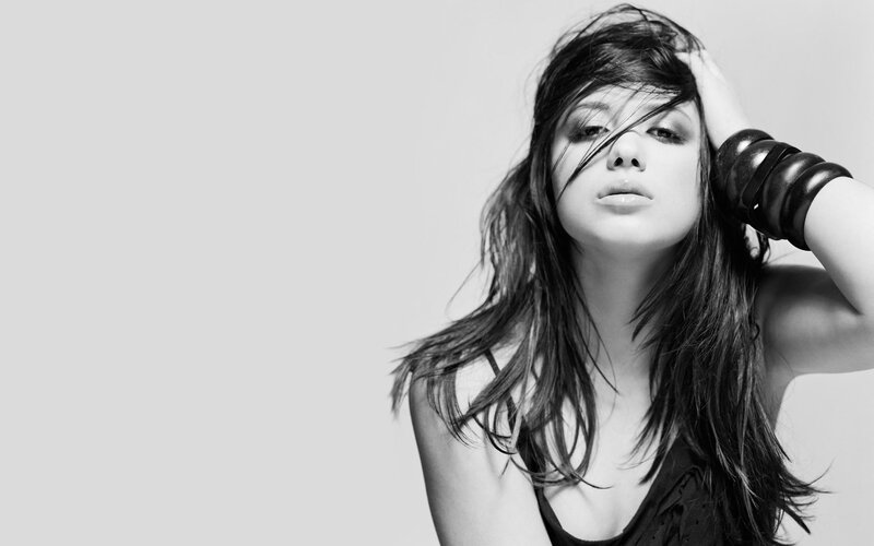 woman with long hair in black and white