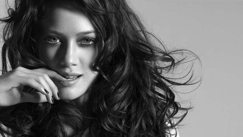 woman with long hair in black and white